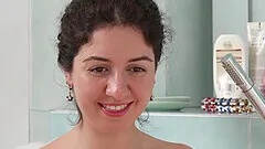 Cute nipple pierced teen toying her tight cunt under water at the glass bathtub