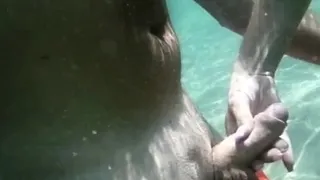 Naked Swimming MILF Gives Underwater Handjob Until He Cums