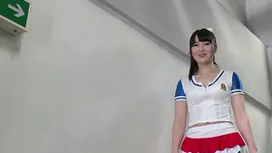 AJapanese cheerleader strips down and sucks a delicious cock