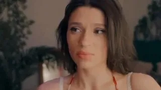 Sexy brunette camgirl teasing in red bikini and in lingerie