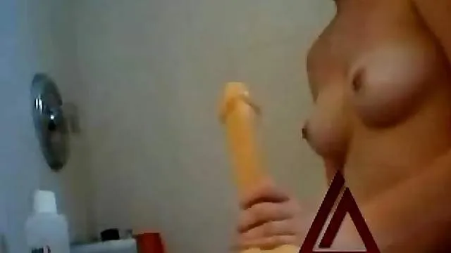 Homemade dildo sex with a cute shaved teen