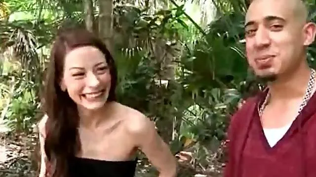 Skinny chick in the woods models her hairy pussy