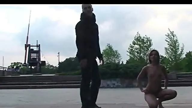 Dude checks out skinny naked girl in public