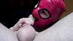 Homemade POV video of a kinky girl with a mask sucking a large cock
