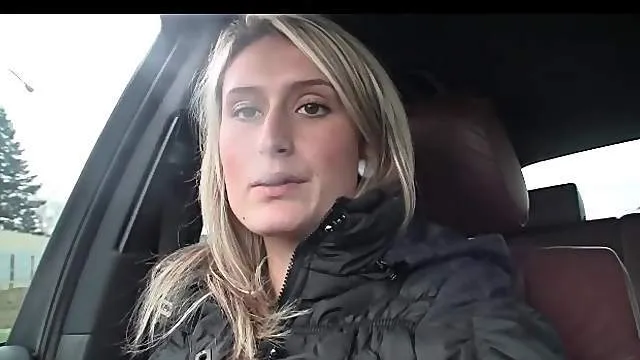 Blonde shows her little tits while smoking in car