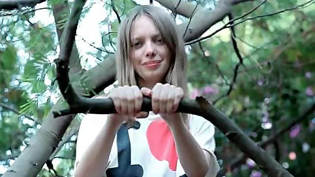 Cute teen babe gets horny rubbing her pussy outdoor