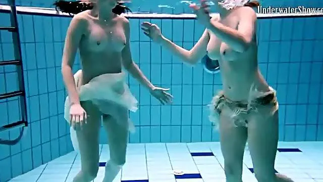 Two ladies with lovely bodies go swimming