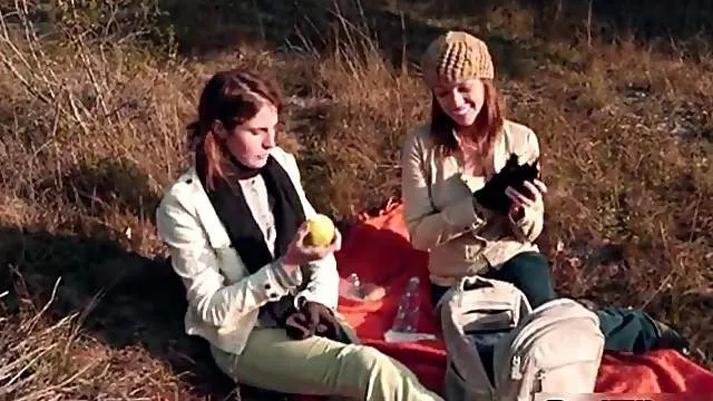 Two hot brunette lesbians getting horny making out outdoor