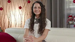 Sweet schoolgirl Liz Jordan showing off her sexy uniform