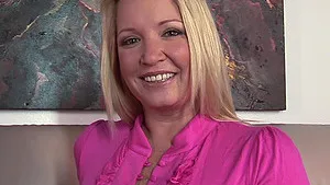 Busty solo MILF Rachel Love drops her panties to play with a dildo