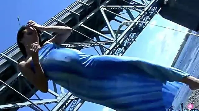 Embrianna shows off her baby bulge on the beach