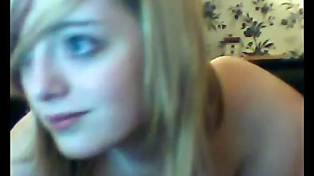Pretty blonde teen teasing in front of the webcam