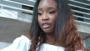 Naomi Foxxx enjoys while having interracial sex on the sofa