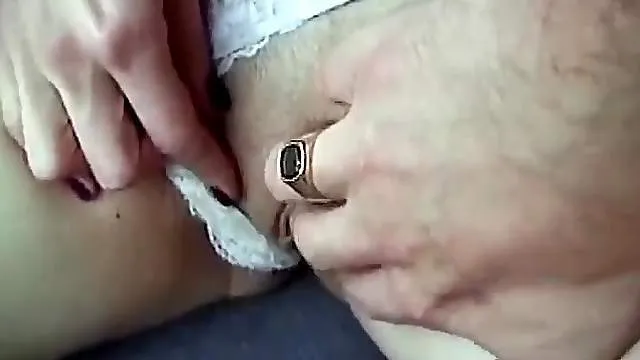 Busty girl in lipstick sucks dick in car