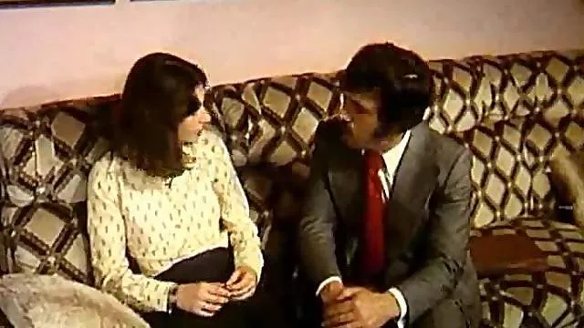 Leggy retro fox gets pumped on the couch