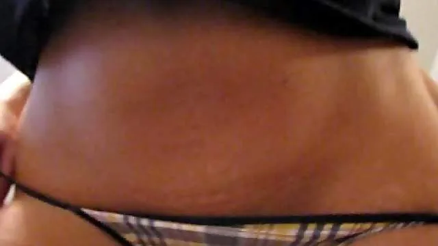 Redhead babe in tiny thong teasing us all