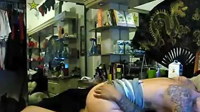 Tattooed couple captures fuck on webcam