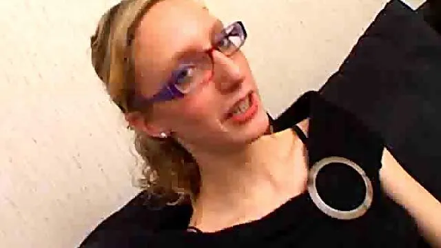 Skinny chick with curly hair sucks a dick