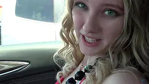 Melody Marks enjoys while getting fingered int he car - POV