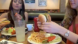 Best friends Alison Faye and Janice Griffith walking on a beach