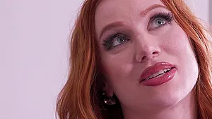 Redhead Madison Morgan enjoys while sucking a big black cock