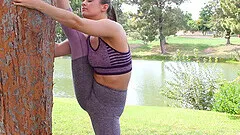 Hot ass amateur chick Devon loves stretching while naked in outdoors