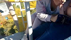 Russian MILF public blowjob and cum swallow Ferris wheel