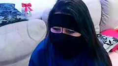 Chubby MILF in hijab masturbates on webcam