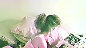 Homemade video of a solo woman wearing lingerie having fun