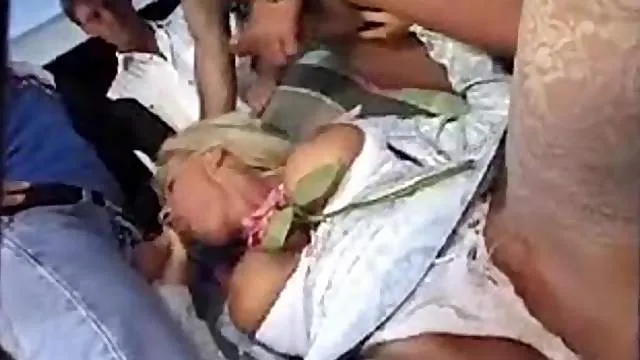 Retro gangbang of a babe in white lingerie