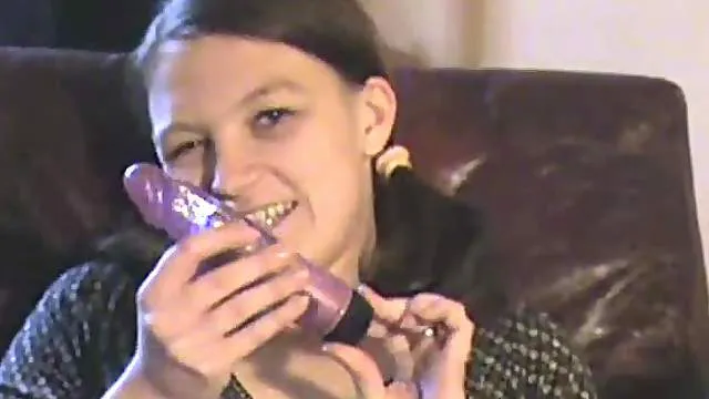 Teen in stockings and boots has toy sex