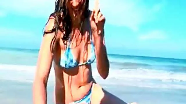 Cute girl fingers deeply at nude beach