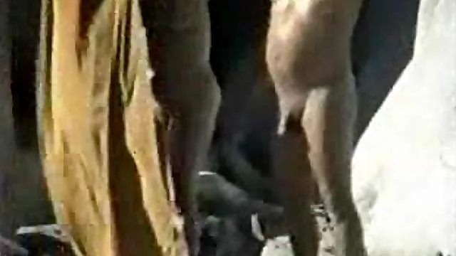 Wife blows her hubby at the beach