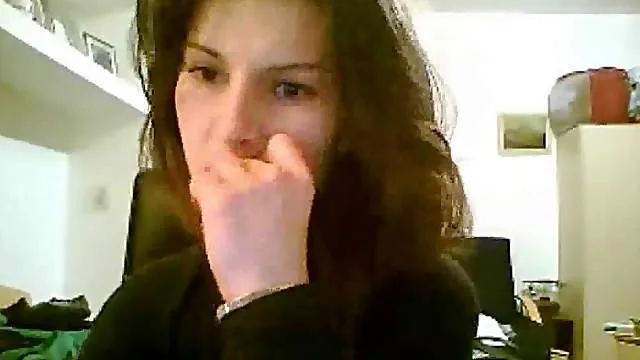 Pretty girl dances a bit on webcam