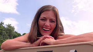 Michelle with small tits fingering her pussy outdoors in the forest