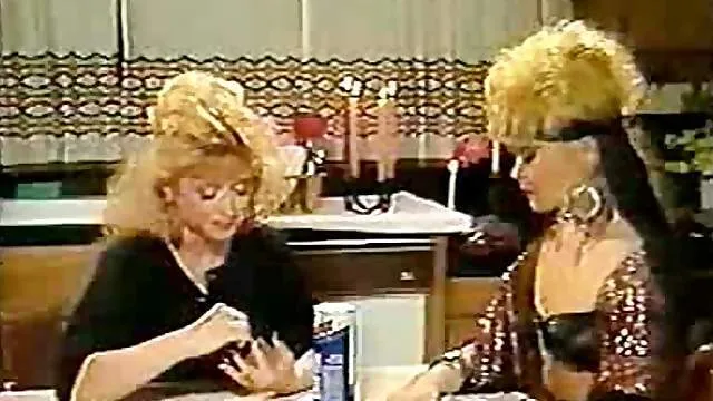 Two 80s girls with big hair eat pussy
