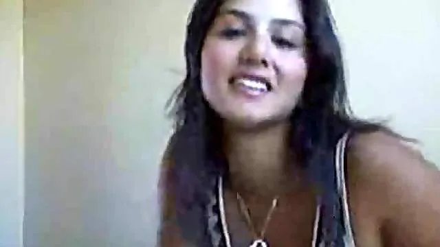 Hot girl rubbing lotion on her tits on webcam