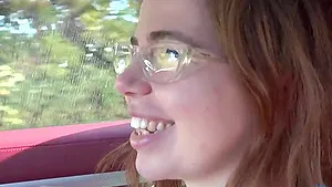 Cute redhead teen Alina West flashing her tight pussy on the beach