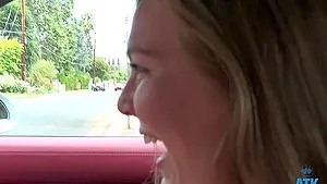 Stella Sedona enjoys while giving a nice handjob in the back of a car