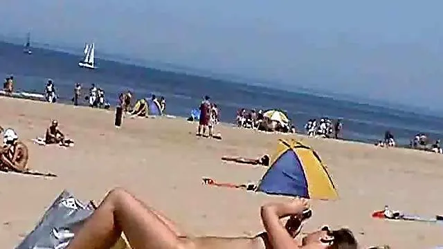 Checking out lots of hotties at nude beach