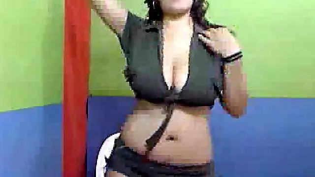 Dancing busty girl uses anal toy