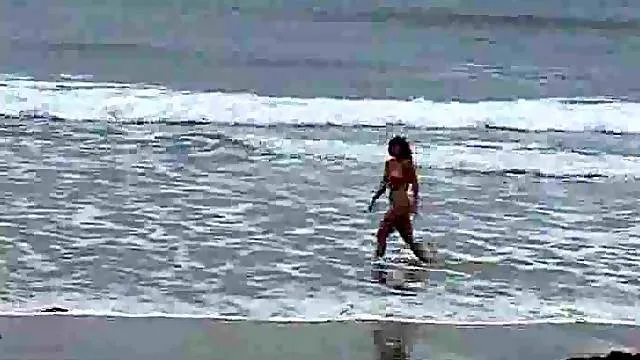 Couple having sex on an empty beach