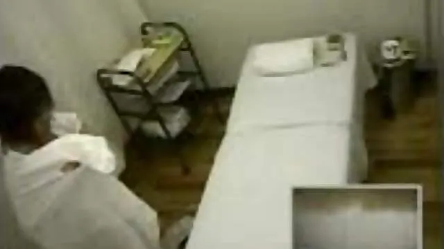 Naked massage caught on voyeur cam