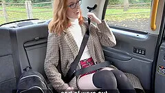 Lenina Crowne with glasses lifts her miniskirt to tease the driver