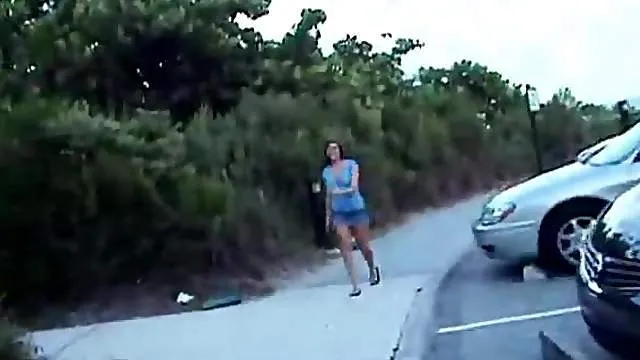 Girl teasing the camera at the beach