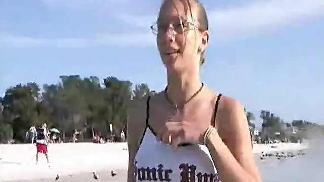 Chick at the beach has fun swimming