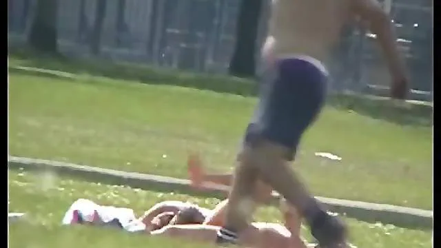 Video of a chick topless in the park