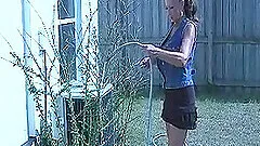 Amateur brunette wife Margo loves to stroke a dick in the shower