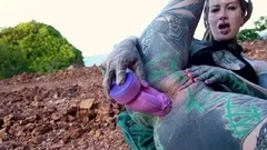 Anuskatzz fucks her ass in public with a big toy