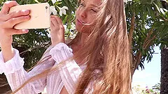 Sexy chick Angel B is bols enough to be naked by the hotel pool